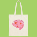An off-white canvas tote bag with a pink brain graphic and the text 'HOT GIRLS HAVE LESIONS' in pink, shown against a solid light green background.
